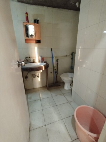 Master Bedroom in 1 BHK Apartment at Royal Palms Garden View, Goregaon East – for Sale
