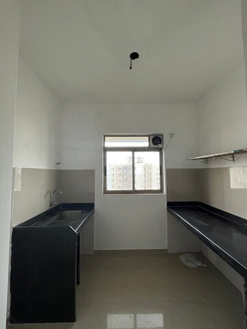 Kitchen in 1 BHK Apartment at Lodha Casa Rio Gold, Dombivli East – for Rent