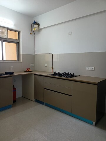 Kitchen in 2 BHK Apartment at Hiranandani Delanna, Ghodbunder Road – for Rent