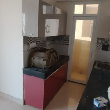 Kitchen in 2 BHK Apartment at Signature The Serenas, Sohna Sector 33 – for Rent