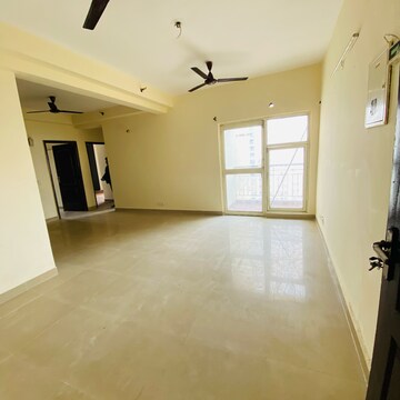 Living Room in 3 BHK Apartment at Aims Golf City, Noida Central – for Rent