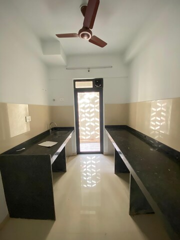 Kitchen in 1 BHK Apartment at Lodha Lakeshore Greens, Dombivli East – for Rent
