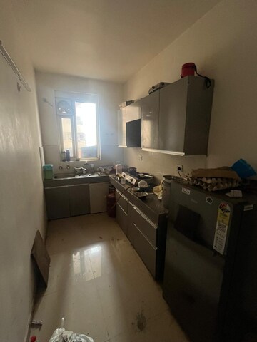 Kitchen in 2 BHK Apartment at Signature Orchard Avenue 2, Sector 93 – for Sale