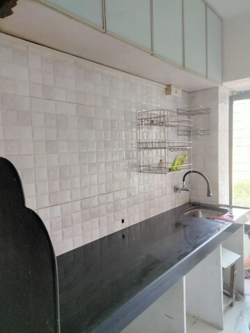 Kitchen in Studio Apartment at Royal Palms Garden View, Goregaon East – for Rent