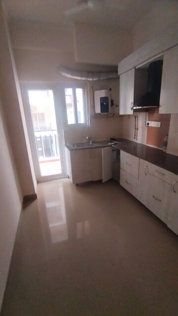 Kitchen in 2 BHK Apartment at Aims Golf City, Sector 75 – for Rent