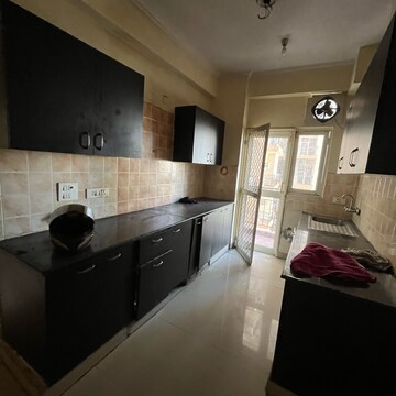 Kitchen in 3 BHK Apartment at Amrapali Zodiac, Sector 120 – for Rent