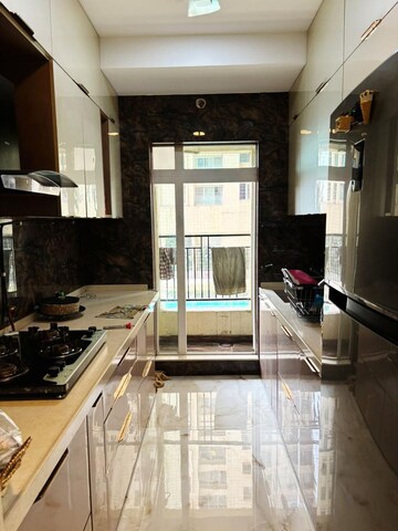 Kitchen in 2 BHK Apartment at Rustomjee Azziano Wing D, Majiwada – for Sale