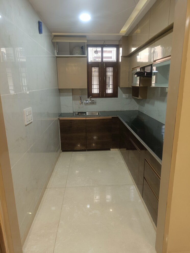 Kitchen, burari 4 Bedroom 135 Sq.Yd. Builder Floor In Burari Delhi 8053450