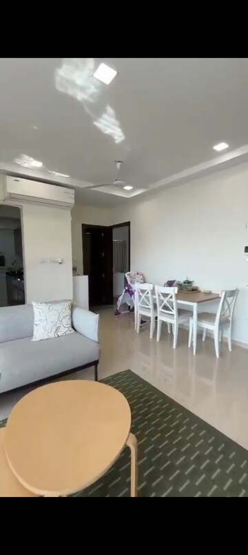 Living Room in 2 BHK Apartment at Ruparel Ariana, Parel – for Rent