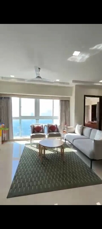 Living Room in 2 BHK Apartment at Ruparel Ariana, Parel – for Rent