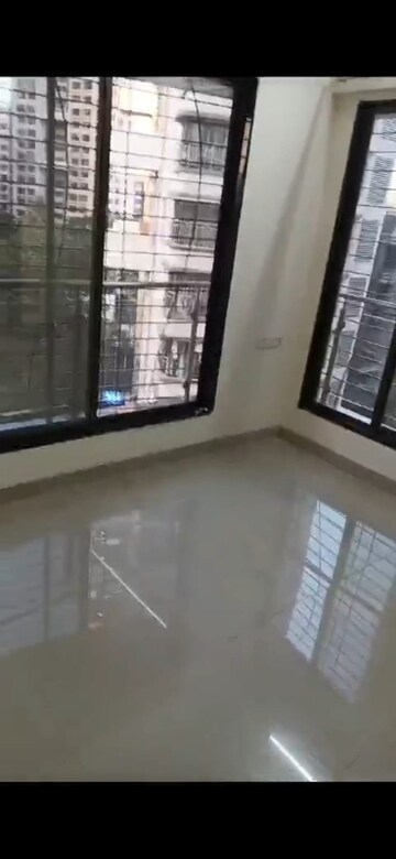 Room in 1 BHK Apartment at Haware Grand Edifice, Malad East – for Sale