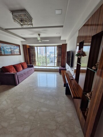Living Room in 2 BHK Apartment at Ruparel Ariana, Parel – for Rent