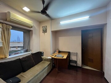 Living Room in 1 BHK Apartment at Lokhandwala Residency, Worli – for Rent
