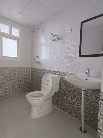 Bathroom in 2.5 BHK Apartment at Saviour Park, Mohan Nagar – for Rent