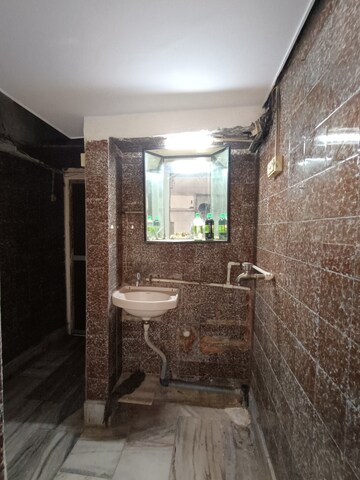 Bathroom in 2 BHK Apartment at Goregaon West – for Rent