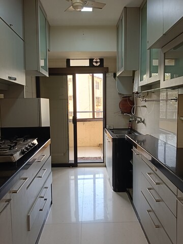 Kitchen in 3 BHK Apartment at Lokhandwala Harmony, Worli – for Rent