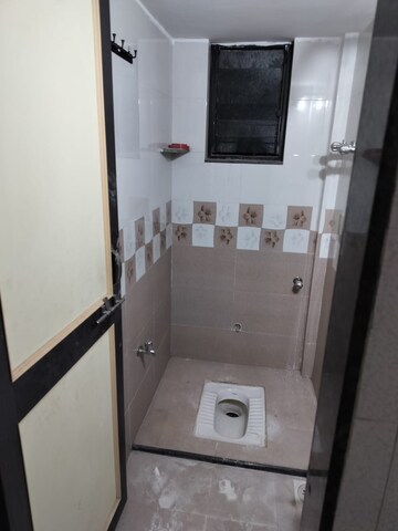 Bathroom in 1 BHK Apartment at Wadgaon Sheri – for Rent