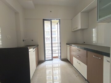 Kitchen in 2 BHK Apartment at Ekta Brooklyn Park, Virar West – for Sale