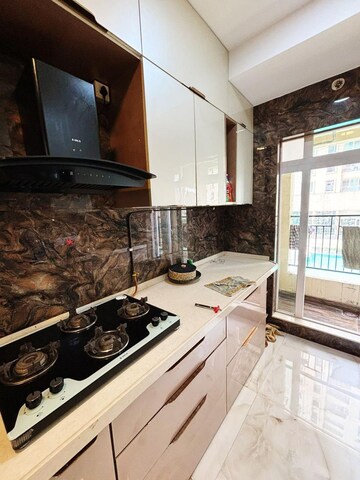 Kitchen in 2 BHK Apartment at Rustomjee Azziano Wing D, Majiwada – for Sale
