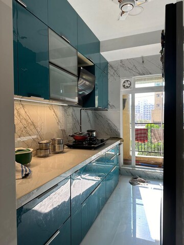 Kitchen in 2 BHK Apartment at Rustomjee Azziano Wing D, Majiwada – for Sale