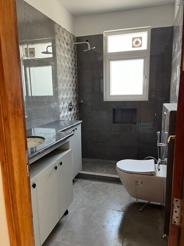 Bathroom in 3 BHK Builder Floor at Ansal Sushant Lok I, Sector 43 – for Rent
