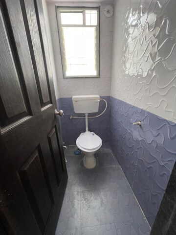 Bathroom in 2 BHK Apartment at PSM Aman Tower, Guruwar Peth – for Sale