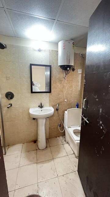 Bathroom in 2.5 BHK Apartment at Amrapali Princely Estate, Sector 76 – for Rent