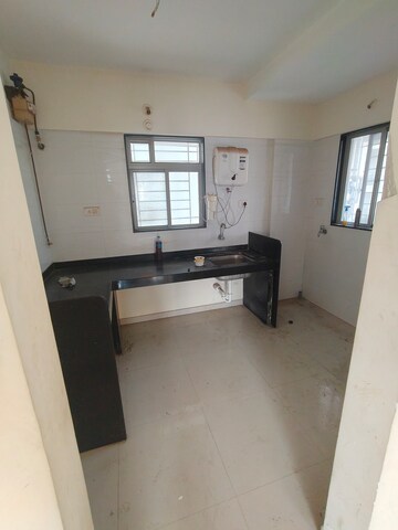 Kitchen in 2 BHK Apartment at Amit Astonia Classic, Undri – for Sale