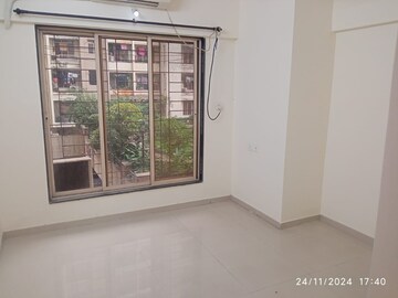Room in 2 BHK Apartment at Bhoomi Acres, Waghbil – for Sale