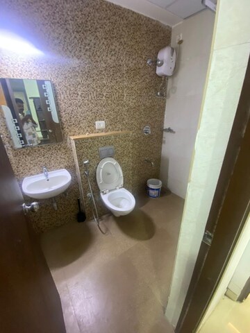Bathroom in 1.5 BHK Apartment at Lodha Palava City, Dombivli East – for Rent