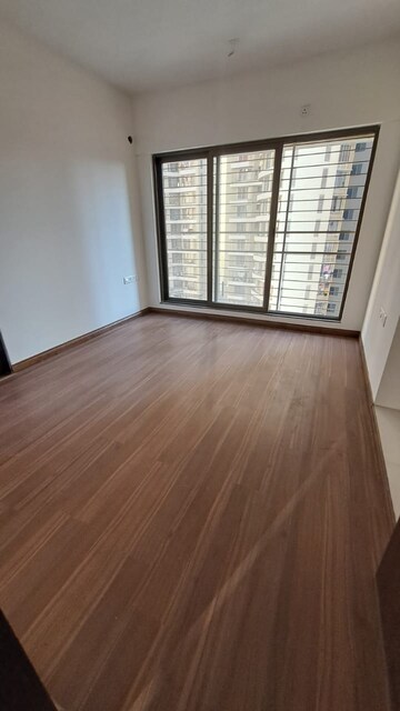 Room in 2 BHK Apartment at Acme Ozone, Manpada – for Sale