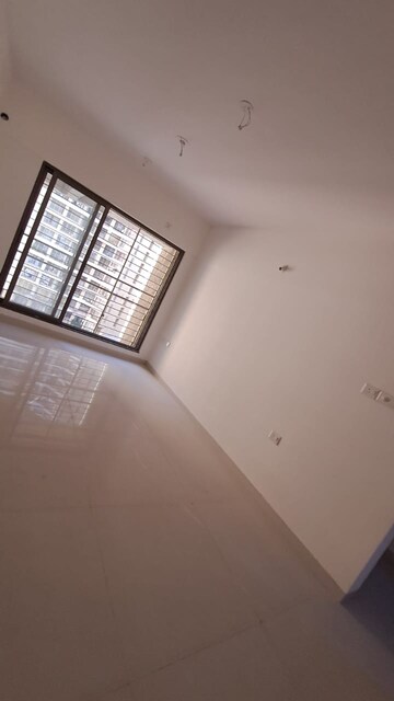 Room in 2 BHK Apartment at Acme Ozone, Manpada – for Sale