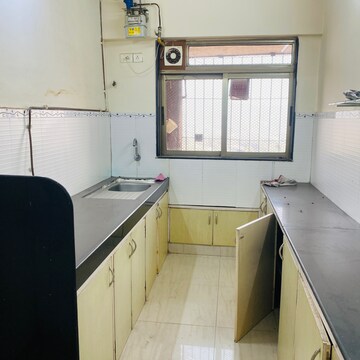 Kitchen in 2 BHK Apartment at Ajmera Cosmic Heights, Bhakti Park – for Rent