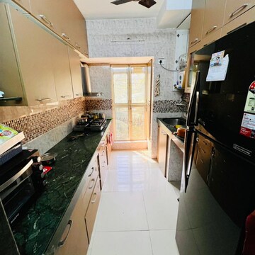 Kitchen in 2 BHK Apartment at Om Surya Darshan CHSL, Mira Road – for Sale
