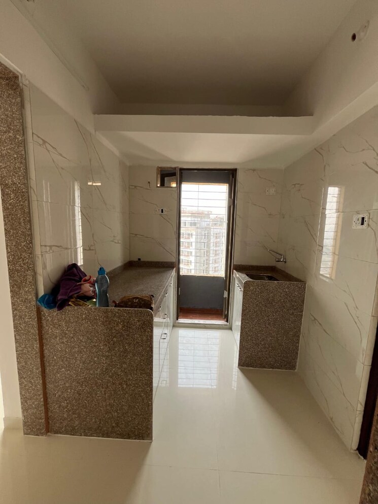 Kitchen, uk-iridium 2 Bedroom 521 Sq.Ft. Apartment In Kandivali East Mumbai 8055135