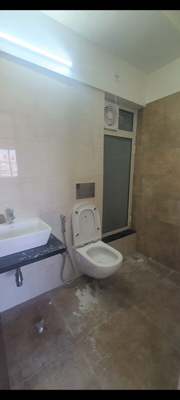 Bathroom in 1 BHK Apartment at Omkar Signet, Malad East – for Rent