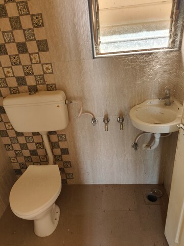 Bathroom in 1 BHK Apartment at Hubtown Greenwoods, Vartak Nagar – for Sale