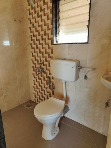 Bathroom in 1 BHK Apartment at Hubtown Greenwoods, Vartak Nagar – for Sale