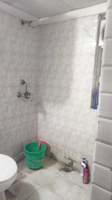 Bathroom in 2.5 BHK Apartment at Aims Golf City, Sector 75 – for Sale