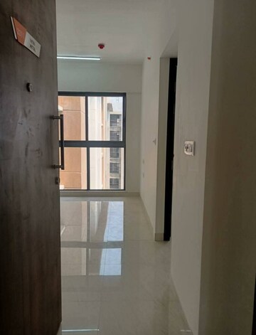 Living Room in 1 BHK Apartment at Lodha Crown Quality Homes, Majiwada – for Rent