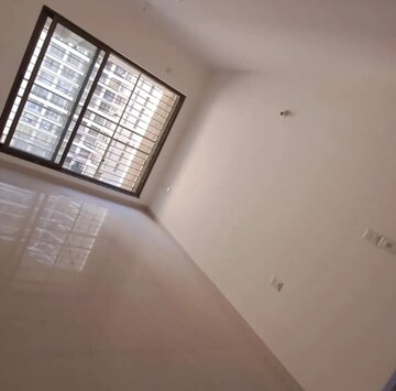 Living Room in 2 BHK Apartment at Acme Ozone, Manpada – for Rent