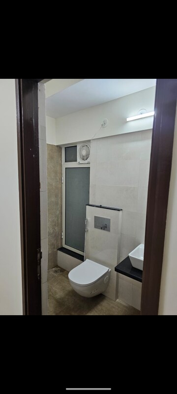 Bathroom in 1 BHK Apartment at Omkar Signet, Malad East – for Rent