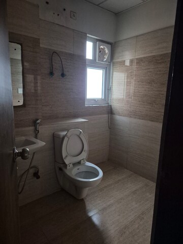 Bathroom in 3 BHK Apartment at Amrapali Zodiac, Sector 120 – for Sale