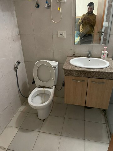 Bathroom in 1 RK Apartment at Nimbus The Golden Palm, Sector 168 – for Rent