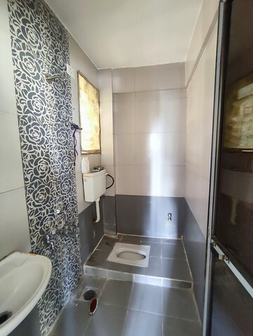 Bathroom in 1 BHK Apartment at Vihang Valley Phase1, Kasarvadavali – for Rent
