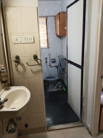 Bathroom in 2 BHK Apartment at Goregaon West View CHS, Goregaon West – for Rent