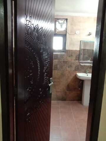 Bathroom in 4 BHK Builder Floor at Green Fields Colony – for Rent