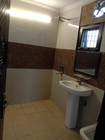 Bathroom in 4 BHK Builder Floor at Green Fields Colony – for Rent