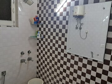 Bathroom in 2 BHK Builder Floor at Freedom Fighters Enclave – for Rent