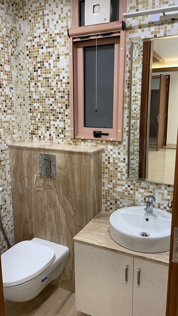 Bathroom in 3 BHK Builder Floor at Uppal Southend, Sector 49 – for Sale